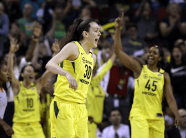 Breanna Stewart (30) celebrates during a 101-83 victory by the Seattle Storm over the Connecticut Sun during the 2018 WNBA regular season. (Image: Elaine Thompson/AP)