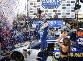 Chase Elliott pulled away in an overtime session to win at Dover International Speedway on Sunday, and secure his advancement to the next round of NASCAR’s playoffs. (Image: AP)